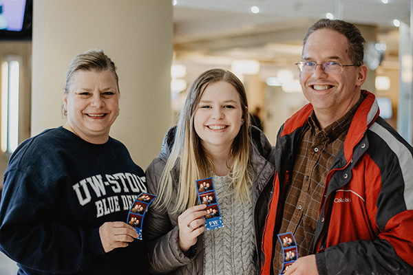 UW-Stout student Sydney Turner visited the photo booth with her parents during 2018 Family Weekend.