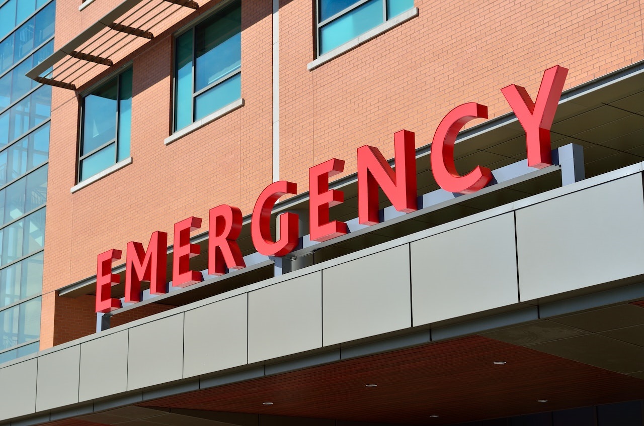 Image of a building with an Emergency sign