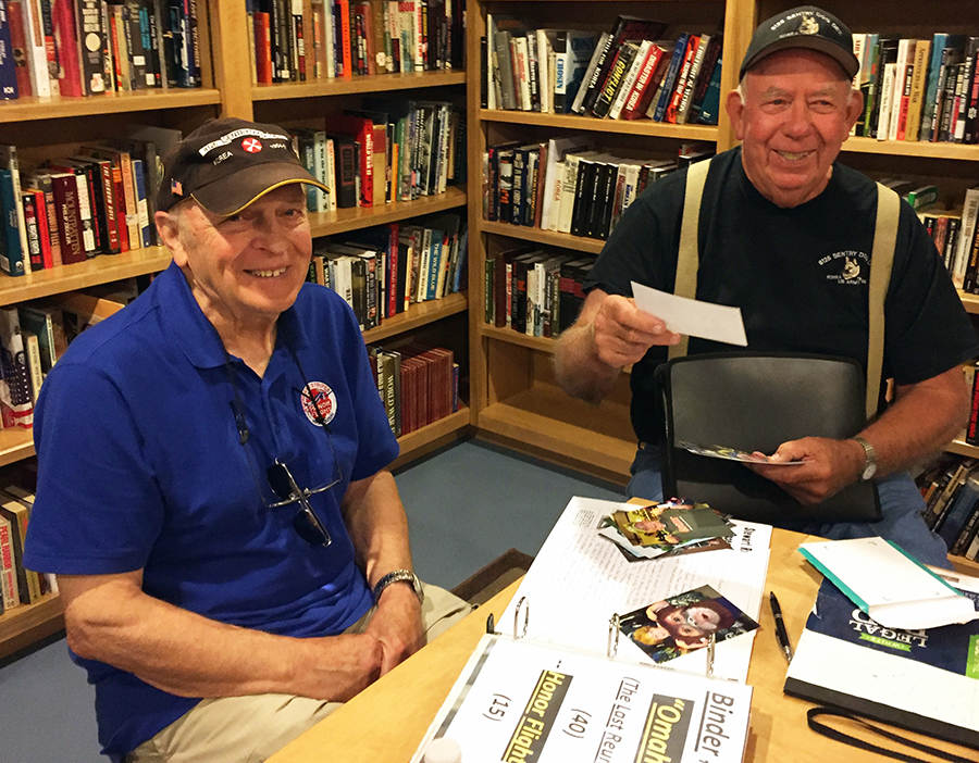 Stewart, at left and Hoggbeck reminisce about serving in Korea with their military dogs during a visit to the Highground Veterans Memorial Park in Neillsville.