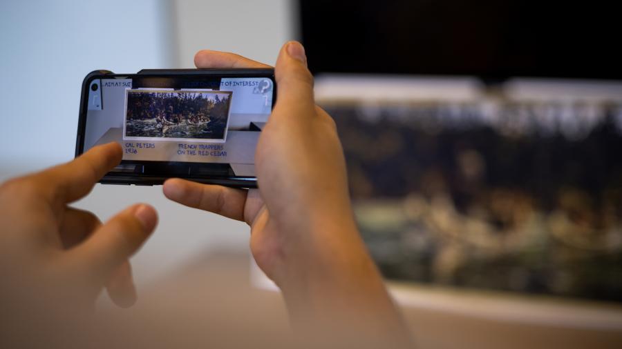 Using the app on a smartphone or tablet, artwork viewers will see an interactive overlay on the art that gives more information about the artist and the work through text, images, audio and video.
