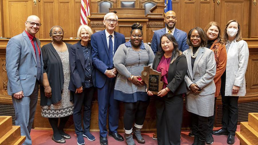 A presentation of the Ann Lydecker Educational Diversity Award from the State Council on Affirmative Action on Oct. 21 in Madison included, from left, SCAA Chair Adin Palau, Bureau of Equity and Inclusion Director Laurice Lincoln, Kathy Evers, Gov. Tony Evers, UW-Stout’s Quin Brooks and Mai Khou Xiong, Lt. Gov. Mandela Barnes, SCAA Vice-Chair Corinda Rainey-Moore, Department of Administration Secretary-designee Kathy Blumenfeld and Department of Personnel Management Administrator Jen Flogel.