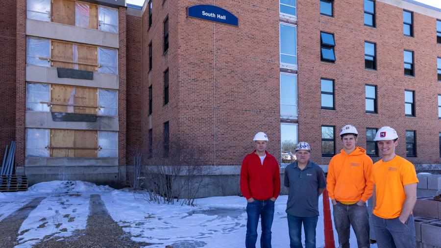 From left, UW-Stout alumni Ryan Wichmann and Chad Schlough and students Tommy Quinn and Noah Gansluckner are part of the crew renovating South Hall.
