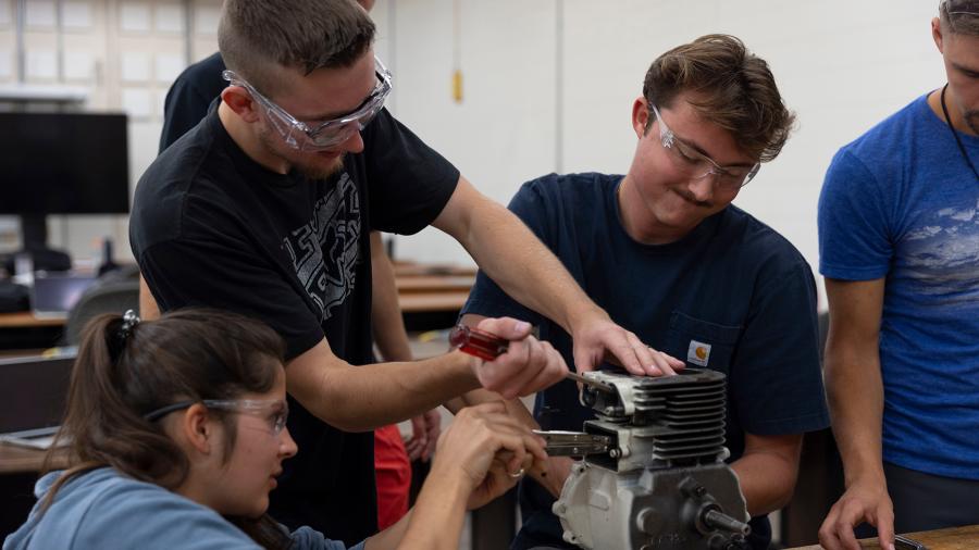 Students in an engineering lab take apart a motor during the first week of classes this fall at UW-Stout