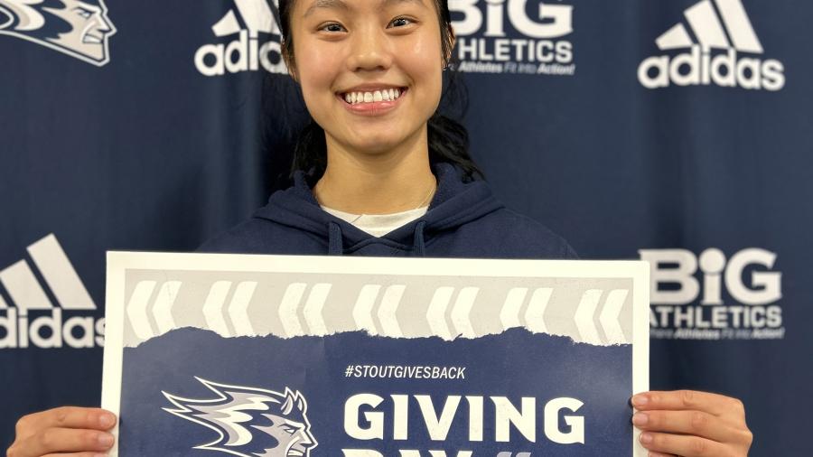 Student Mai Nou Vang, a member of the women’s lacrosse team, promotes Giving Day at UW-Stout.