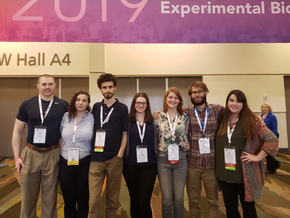 UW-Stout ASBMB members posing under the Experimental Biology 2019 banner.