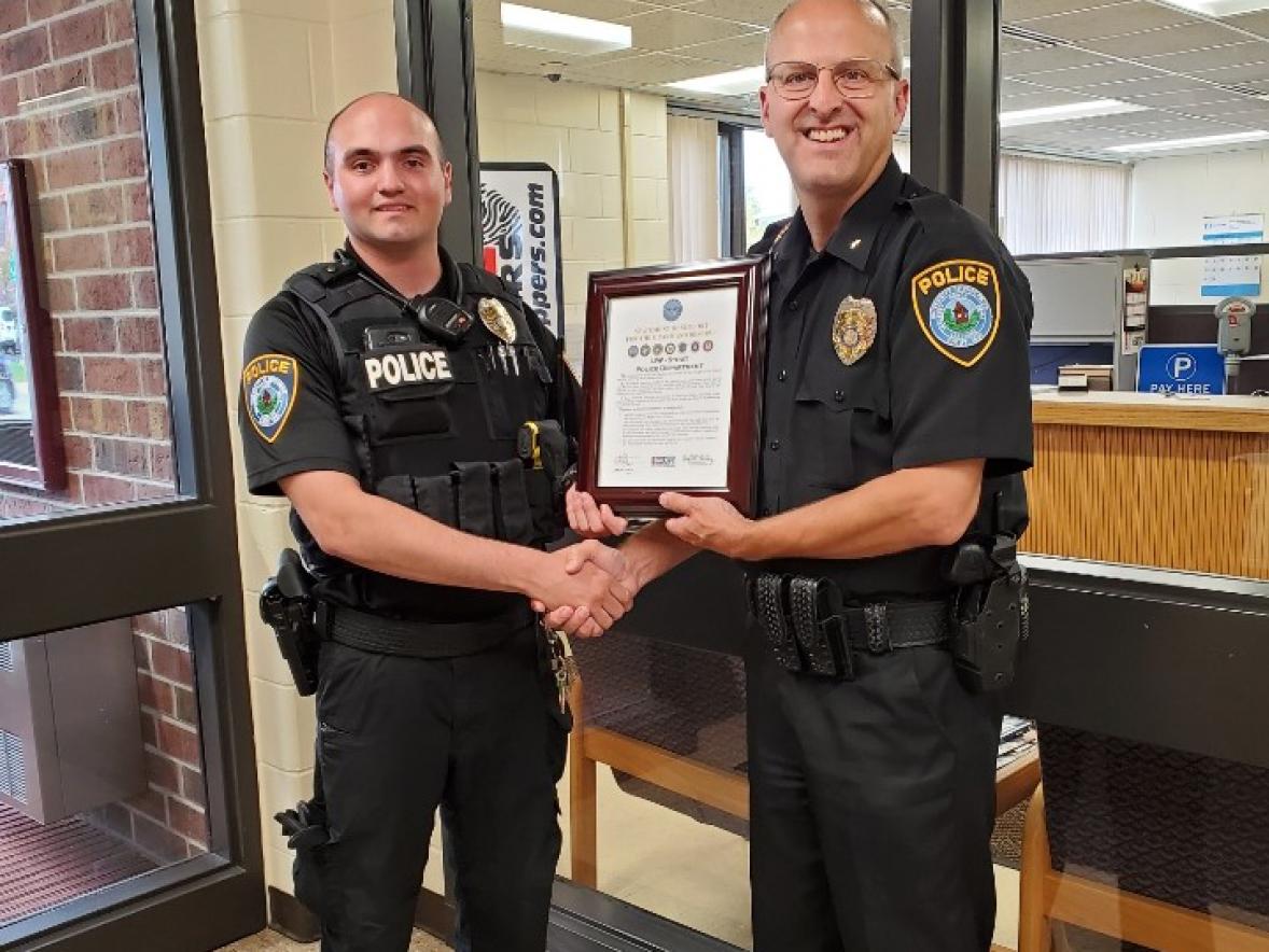 UW-Stout student Grant Kjellberg, of Eau Claire, at left, pictured with UW-Stout Police Chief Jason Spetz. Kjellberg is a part-time officer with the UW-Stout Police Department and is deploying to the Middle East.