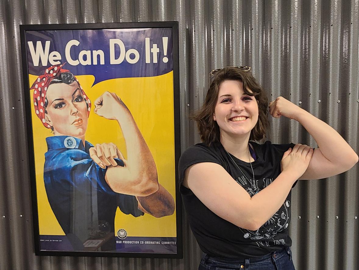 Melissa Neumaier with a Rosie the Riveter, the star of a campaign to recruit female defense workers in WWII and became a symbol of strength. / Photo courtesy Melissa Neumaier