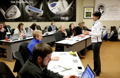 Kris Schoonover teaches a golf enterprise management class.