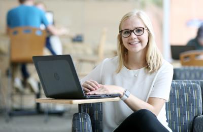 Roselyn Anderson, a senior from Eagan, MN majoring in Applied Social Science and Economics, and minoring in Business Administration, is photographed in the Memorial Student Center
