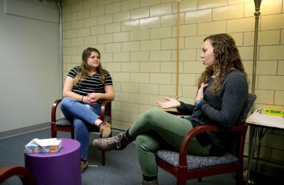Students perform one-on-one counseling sessions in the Counseling Lab on campus.