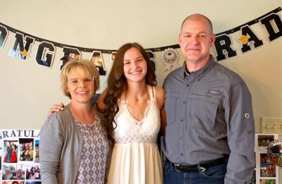 Annabelle Meyer with her parents Reid and Jean.