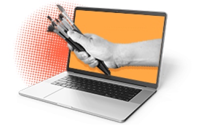 Artistic hand holding brushes shown in computer screen. 