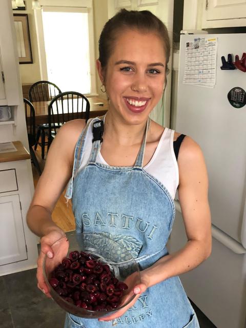 HRTM student Rayne Holmson in her kitchen at home.