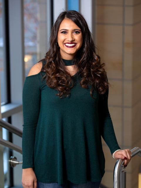 Asha Bahr, rehabilitation services graduate and rehabilitation counseling student in the the MSC stairwell.